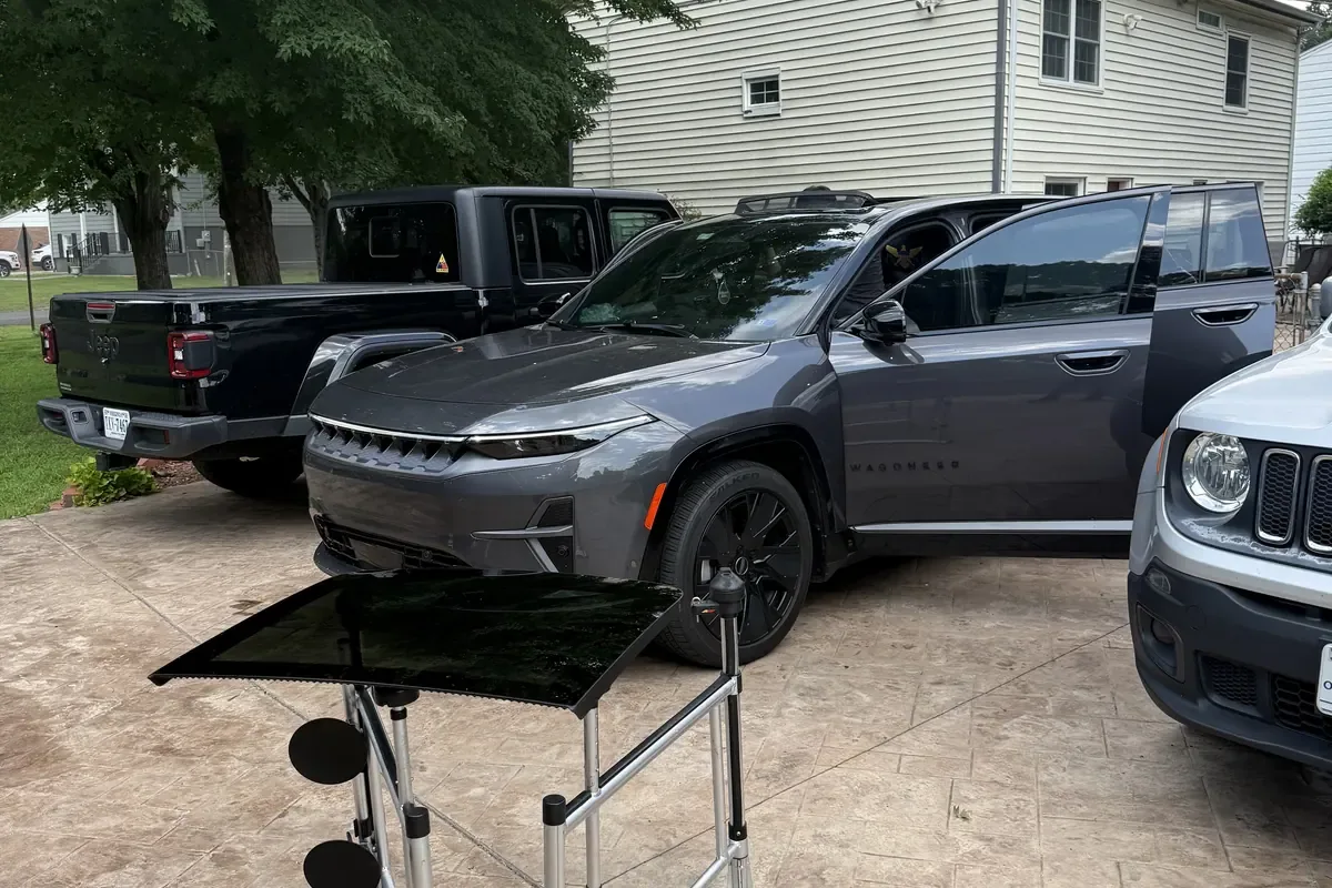 Mobile glass job set up on a residential driveway