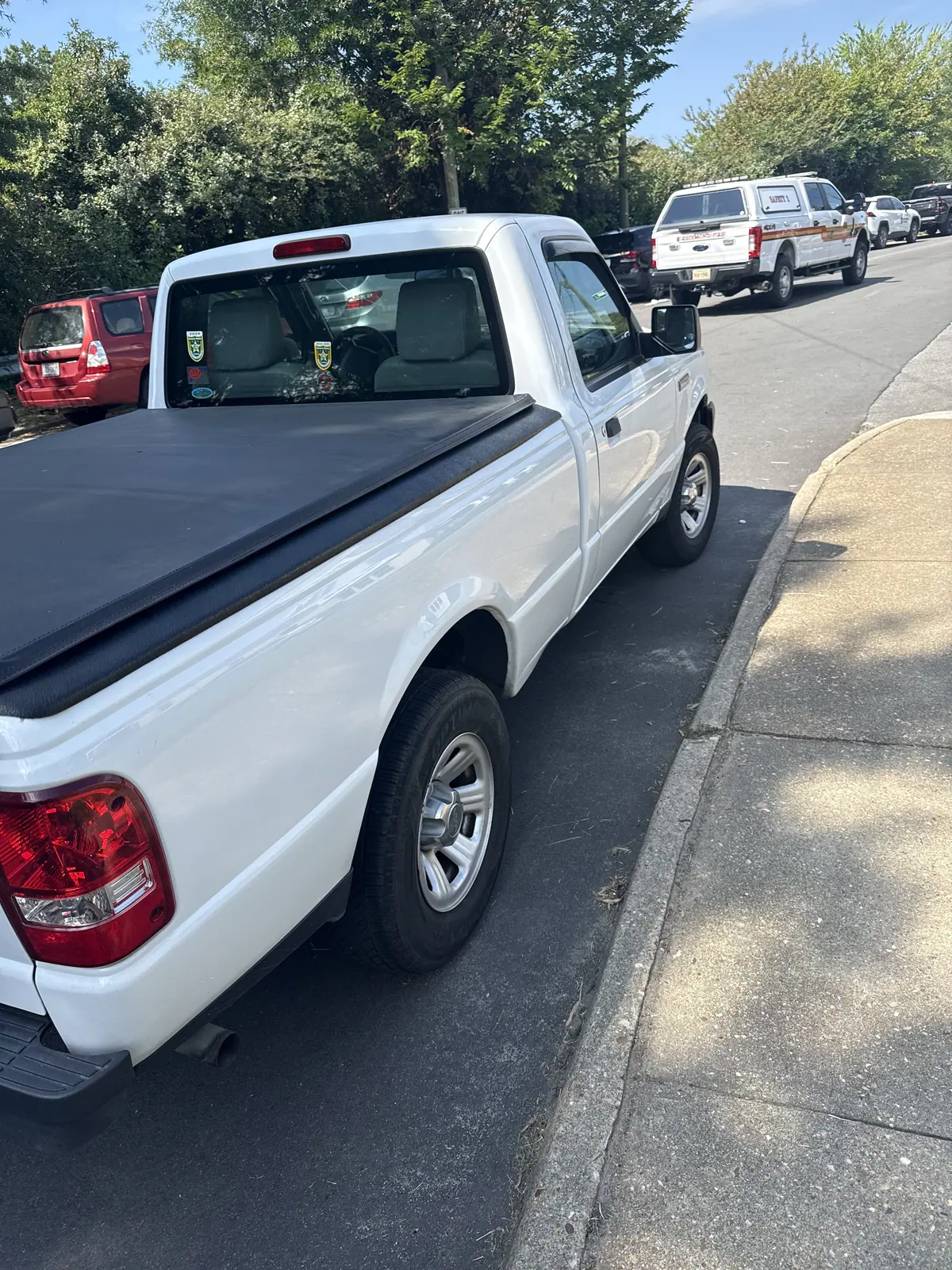 Back glass replaced on a white Ford Ranger