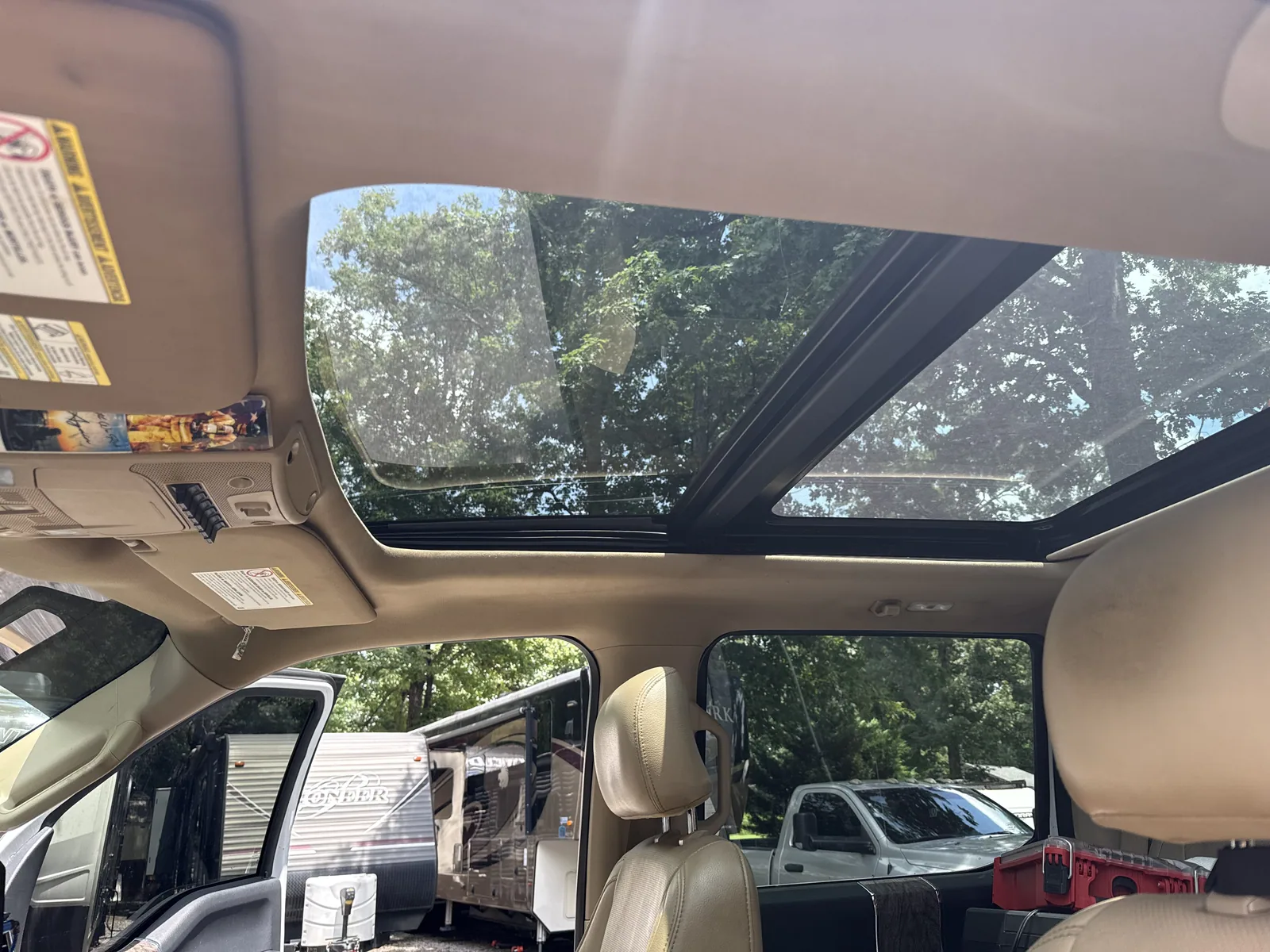 Panoramic sunroof glass viewed from inside a vehicle