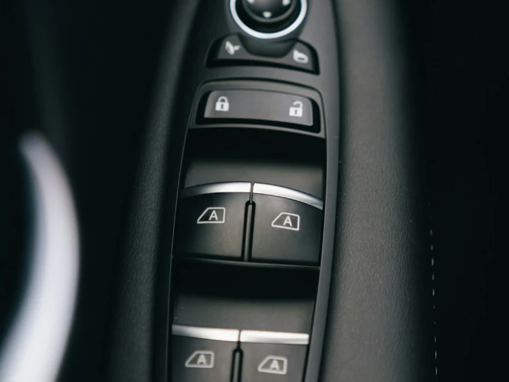 Power window and lock switches on a driver door panel