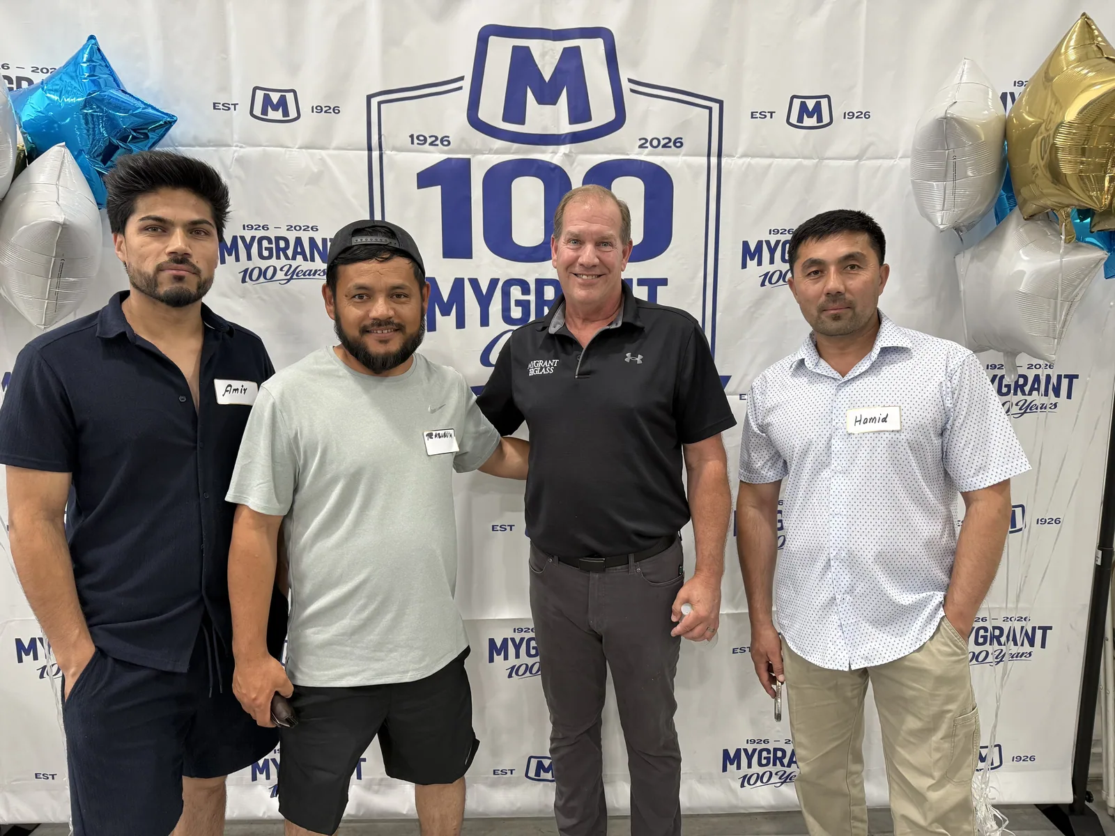 The Sunrise AutoGlass team at a Mygrant Glass anniversary event