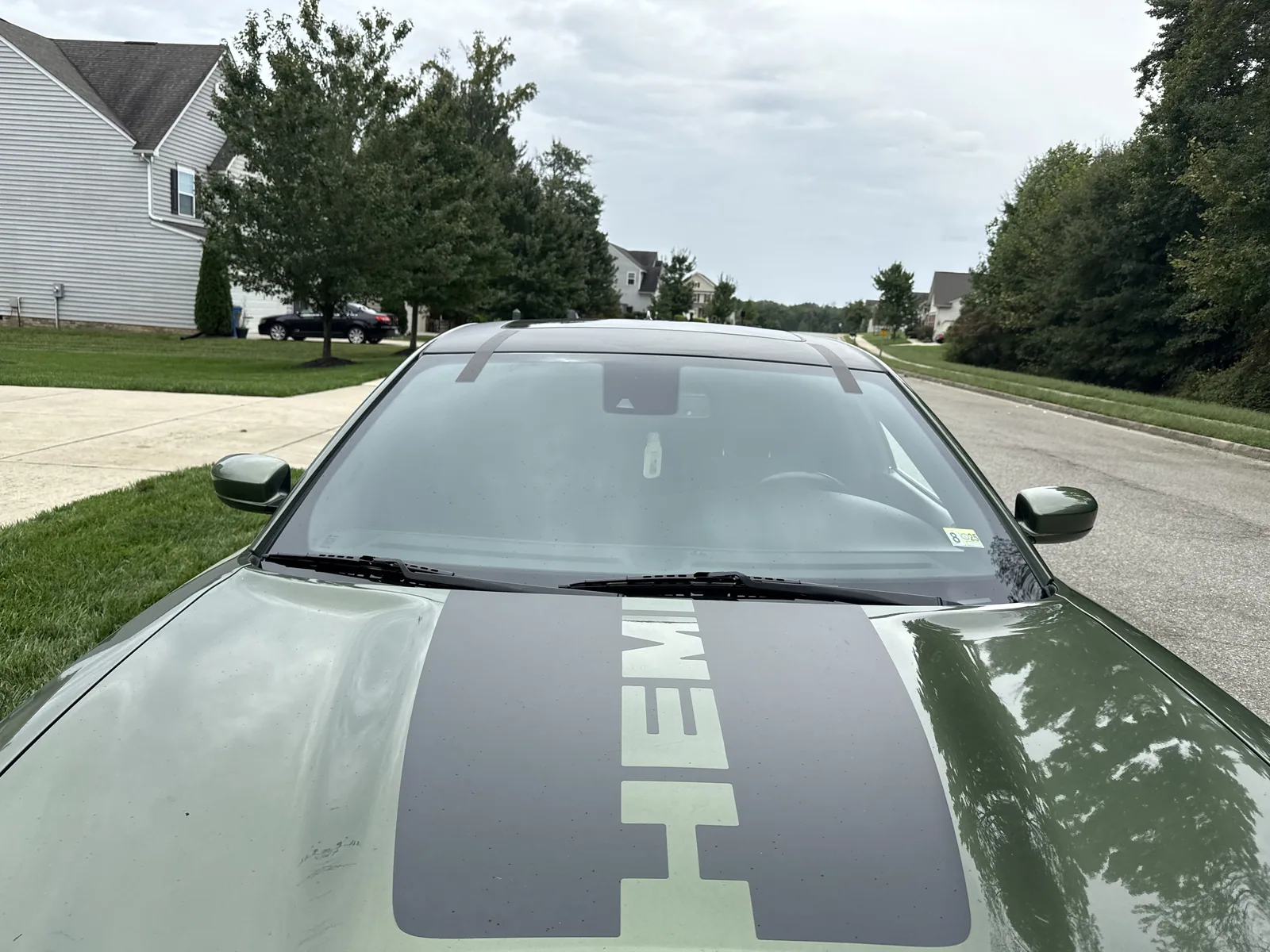 Windshield on a Dodge Charger seen from the hood
